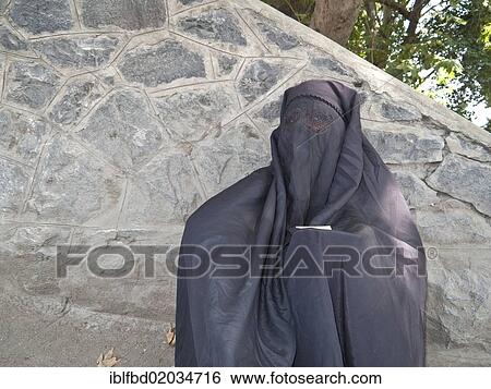 "Muslim woman dressed in a burka, in traditional area of Srinagar, Jammu and Kashmir, India, Asia" View Large Photo Image Stock Photograph - "Muslim woman dressed in a burka, in traditional area of Srinagar, Jammu and Kashmir, India, Asia". Fotosearch