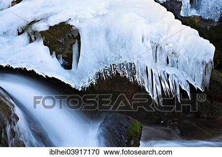 Stock Image - "Myra Falls with ice in winter in Muggendorf, Lower Austria, Austria, Europe". Fotosearch