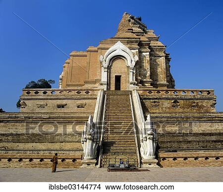 Picture - "Naga staircase, monk in front of the ruins of Wat Chedi Luang Temple, Chiang Mai, Northern Thailand, Thailand, Asia". Fotosearch