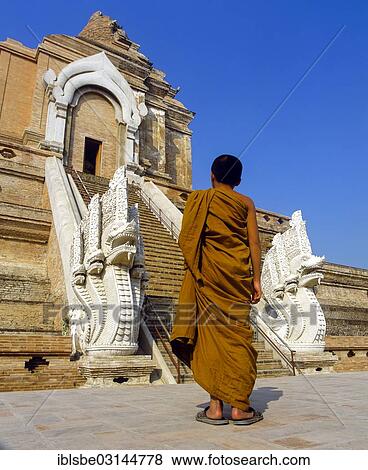 "Naga staircase, monk in front of the ruins of Wat Chedi Luang Temple, Chiang Mai, Northern Thailand, Thailand, Asia" View Large Photo Image Stock Photo - "Naga staircase, monk in front of the ruins of Wat Chedi Luang Temple, Chiang Mai, Northern Thailand, Thailand, Asia". Fotosearch