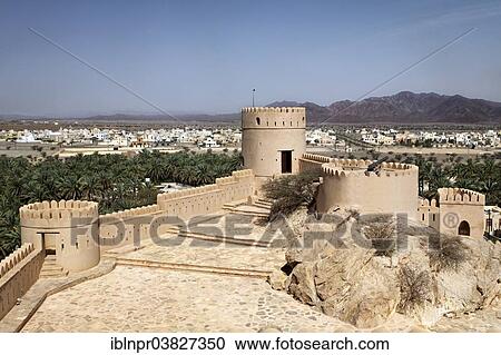 "Nakhl Fort or Husn Al Heem, fortress, historic mudbrick building, Al-Batinah province, Sultanate of Oman, Arabian Peninsula" View Large Photo Image Stock Image - "Nakhl Fort or Husn Al Heem, fortress, historic mudbrick building, Al-Batinah province, Sultanate of Oman, Arabian Peninsula". Fotosearch