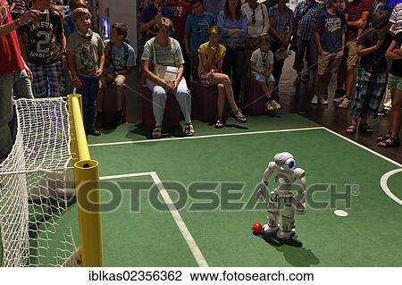 "NAO playing football, a humanoid robot from Aldebaran Robotics, IdeenPark 2012, technology and education summit conference for young people, Essen, Ruhr area, North Rhine-Westphalia, Germany, Europe" View Large Photo Image Stock Image - "NAO playing football, a humanoid robot from Aldebaran Robotics, IdeenPark 2012, technology and education summit conference for young people, Essen, Ruhr area, North Rhine-Westphalia, Germany, Europe". Fotosearch