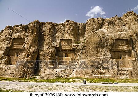 Stock Image - "Naqsh-e Rostam, The four Achaemenid Tombs, carved in the Rock: Tomb of Darius II, Artaxerxes, Darius The Great, and Xerxes, Marvdascht, Fars, Iran, Asia". Fotosearch