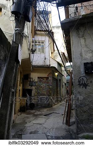"Narrow alley in a slum or favela, Jacarezinho favela, Rio de Janeiro, Rio de Janeiro State, Brazil, South America" View Large Photo Image Stock Photo - "Narrow alley in a slum or favela, Jacarezinho favela, Rio de Janeiro, Rio de Janeiro State, Brazil, South America". Fotosearch