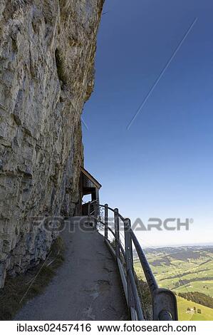 Stock Photograph - "Narrow ridge along the rockface of Mt Ebenalp between Wildkirchli and the Aescher mountain inn, Wasserauen, Appenzell Innerrhoden, Appenzell Inner Rhodes, Switzerland, Europe, PublicGround, Europe". Fotosearch