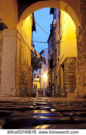 "Narrow street at dusk, Rovinj, Istria, Croatia, Europe" View Large Photo Image Stock Photograph - "Narrow street at dusk, Rovinj, Istria, Croatia, Europe". Fotosearch
