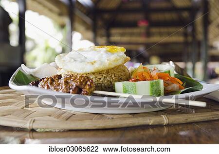 "Nasi Goreng, Indonesian fried rice, Ubud, Bali, Indonesia, Asia" View Large Photo Image Stock Image - "Nasi Goreng, Indonesian fried rice, Ubud, Bali, Indonesia, Asia". Fotosearch