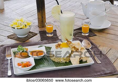 "Nasi Goreng, Indonesian fried rice, Indonesian cuisine, at a restaurant, Ubud, Bali, Indonesia, Asia" View Large Photo Image Stock Image - "Nasi Goreng, Indonesian fried rice, Indonesian cuisine, at a restaurant, Ubud, Bali, Indonesia, Asia". Fotosearch