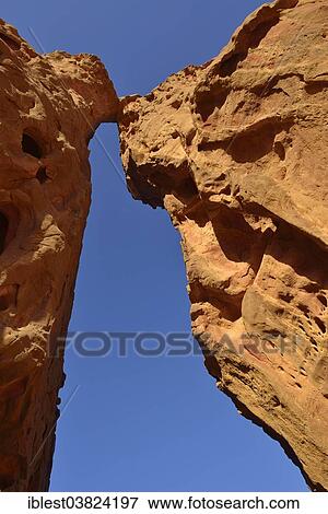 "Natural arch the Cirque, Tadrart region, Tassili n'Ajjer National Park, Unesco World Heritage Site, Algeria, Sahara, North Africa, Africa" View Large Photo Image Stock Photo - "Natural arch the Cirque, Tadrart region, Tassili n'Ajjer National Park, Unesco World Heritage Site, Algeria, Sahara, North Africa, Africa". Fotosearch