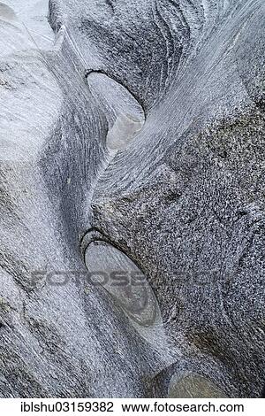 "Natural stone formations ground by the Verzasca River, Lavertezzo, Locarno, Kanton Tessin, Switzerland, Europe" View Large Photo Image Stock Image - "Natural stone formations ground by the Verzasca River, Lavertezzo, Locarno, Kanton Tessin, Switzerland, Europe". Fotosearch