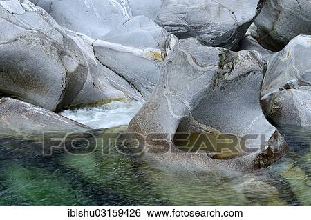 Stock Photograph - "Natural stone formations ground by the Verzasca River, Lavertezzo, Locarno, Kanton Tessin, Switzerland, Europe". Fotosearch