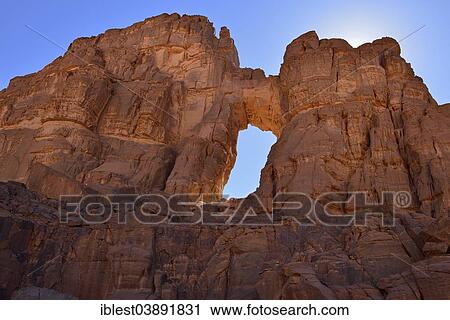 "Natural window in Tamezguida or La Cathedrale, Tadrart, Tassili n'Ajjer National Park, Unesco World Heritage Site, Sahara desert, Algeria, Africa" View Large Photo Image Stock Image - "Natural window in Tamezguida or La Cathedrale, Tadrart, Tassili n'Ajjer National Park, Unesco World Heritage Site, Sahara desert, Algeria, Africa". Fotosearch