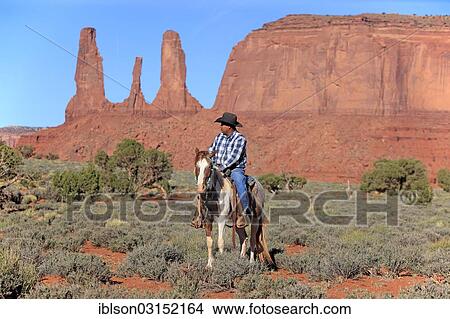 "Navajo cowboy riding on a Mustang, Utah, United States, North America" View Large Photo Image Picture - "Navajo cowboy riding on a Mustang, Utah, United States, North America". Fotosearch