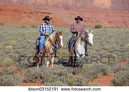 "Navajo cowboys riding on Mustangs, Utah, United States, North America" View Large Photo Image Stock Image - "Navajo cowboys riding on Mustangs, Utah, United States, North America". Fotosearch