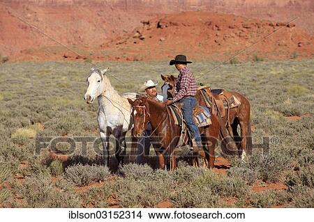 "Navajo cowboys with Mustangs, Utah, United States, North America" View Large Photo Image Picture - "Navajo cowboys with Mustangs, Utah, United States, North America". Fotosearch
