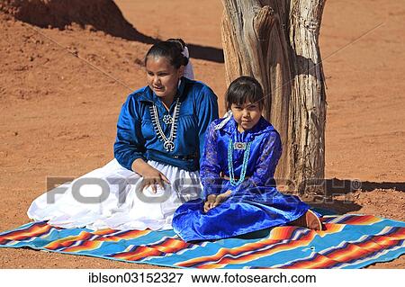 "Navajo Indian mother and daughter, Monument Valley, Utah, United States, North America" View Large Photo Image Stock Photo - "Navajo Indian mother and daughter, Monument Valley, Utah, United States, North America". Fotosearch