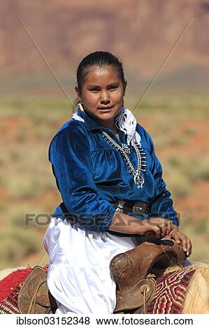 "Navajo Indian woman riding a horse, Monument Valley, Utah, United States, North America" View Large Photo Image Stock Photo - "Navajo Indian woman riding a horse, Monument Valley, Utah, United States, North America". Fotosearch