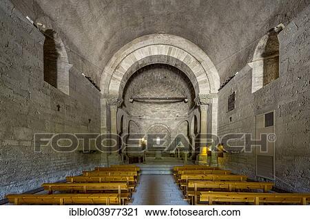 Stock Image - "Nave, interior of Romanesque church of Santa Maria de Porqueres, Porqueres, Catalonia, Spain, Europe". Fotosearch