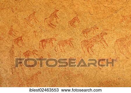Stock Image - "Neolithic rock art, painting, herd of cows, Tin Meskis, Immidir or Mouydir, Sahara, Tamanrasset Province, Algeria, Africa". Fotosearch