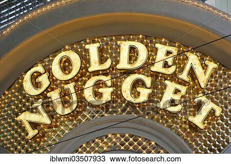Stock Image - "Neon signage of the Golden Nugget Gambling Hotel and Casino, Fremont Street Experience in old Vegas, downtown, Las Vegas, Nevada, United States, North America". Fotosearch