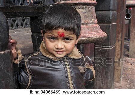 "Nepalese boy at the Manakamana Temple, Mugling, portrait, Nepal, Asia" View Large Photo Image Stock Photo - "Nepalese boy at the Manakamana Temple, Mugling, portrait, Nepal, Asia". Fotosearch