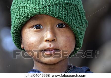 "Nepalese boy with a green cap, portrait, Bandipur, Nepal, Asia" View Large Photo Image Stock Photo - "Nepalese boy with a green cap, portrait, Bandipur, Nepal, Asia". Fotosearch