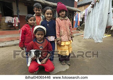 "Nepalese children with little dog outside her house, Bandipur, Nepal, Asia" View Large Photo Image Stock Photograph - "Nepalese children with little dog outside her house, Bandipur, Nepal, Asia". Fotosearch