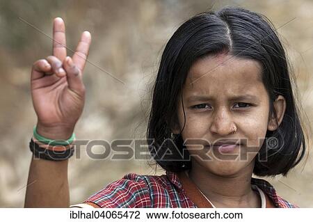"Nepalese girl making victory sign, peace symbol, Portrait, Bandipur, Nepal, Asia" View Large Photo Image Stock Image - "Nepalese girl making victory sign, peace symbol, Portrait, Bandipur, Nepal, Asia". Fotosearch
