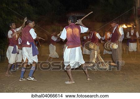 "Nepalese men perform a traditional dance, Sauraha, Nepal, Asia" View Large Photo Image Picture - "Nepalese men perform a traditional dance, Sauraha, Nepal, Asia". Fotosearch