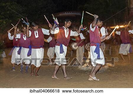 "Nepalese men perform a traditional dance, Sauraha, Nepal, Asia" View Large Photo Image Stock Photo - "Nepalese men perform a traditional dance, Sauraha, Nepal, Asia". Fotosearch