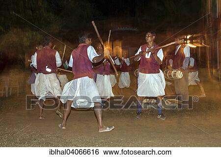"Nepalese men perform a traditional dance, Sauraha, Nepal, Asia" View Large Photo Image Stock Photograph - "Nepalese men perform a traditional dance, Sauraha, Nepal, Asia". Fotosearch