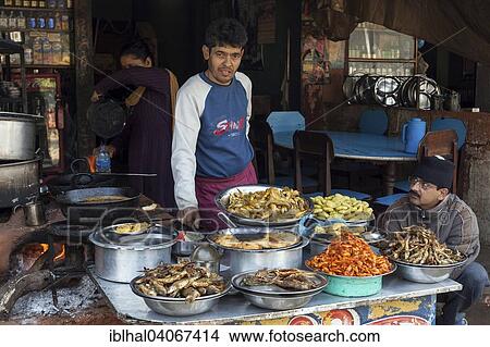 "Nepalese restaurant with cooker and displayed food, Mugling, Nepal, Asia" View Large Photo Image Picture - "Nepalese restaurant with cooker and displayed food, Mugling, Nepal, Asia". Fotosearch