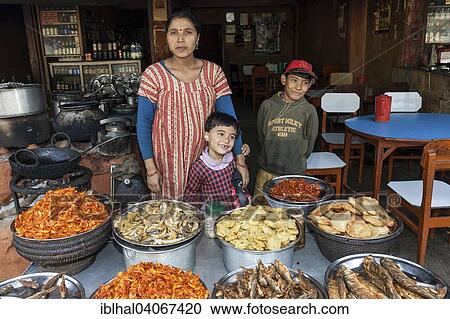 "Nepalese restaurant with cooker and displayed food, Mugling, Nepal, Asia" View Large Photo Image Stock Image - "Nepalese restaurant with cooker and displayed food, Mugling, Nepal, Asia". Fotosearch