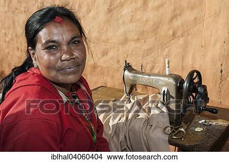 "Nepalese seamstress, tailor, portrait, Nargakot, Nepal, Asia" View Large Photo Image Picture - "Nepalese seamstress, tailor, portrait, Nargakot, Nepal, Asia". Fotosearch