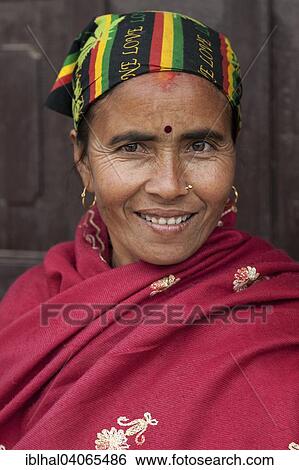 "Nepalese woman with colourful headscarf and red cape, portrait, Bandipur, Nepal, Asia" View Large Photo Image Stock Photograph - "Nepalese woman with colourful headscarf and red cape, portrait, Bandipur, Nepal, Asia". Fotosearch