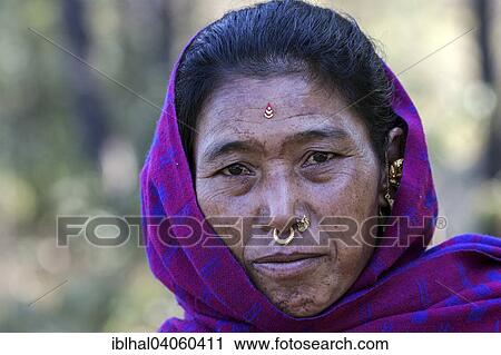 "Nepalese woman with earrings and nose piercing, portrait, with Nargakot, Nepal, Asia" View Large Photo Image Stock Image - "Nepalese woman with earrings and nose piercing, portrait, with Nargakot, Nepal, Asia". Fotosearch