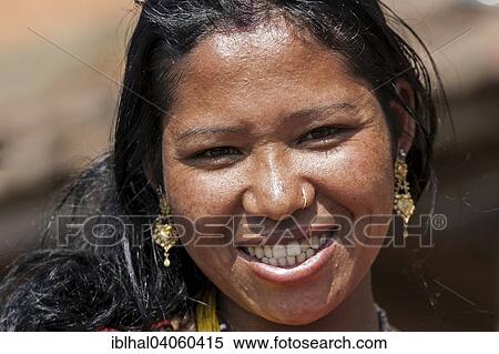"Nepalese woman with earrings and nose piercing, portrait, with Nargakot, Nepal, Asia" View Large Photo Image Stock Photography - "Nepalese woman with earrings and nose piercing, portrait, with Nargakot, Nepal, Asia". Fotosearch