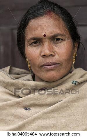 Picture - "Nepalese woman with earrings, portrait, Bandipur, Nepal, Asia". Fotosearch