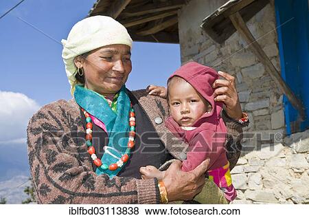 "Nepali mother with her baby, Sete, Solukhumbu District, Sagarmatha Zone, Nepal, Asia" View Large Photo Image Stock Photo - "Nepali mother with her baby, Sete, Solukhumbu District, Sagarmatha Zone, Nepal, Asia". Fotosearch