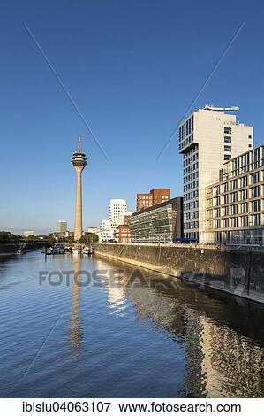 Stock Photo - "Neuer Zollhof and TV tower, Media Harbour, Dusseldorf, North Rhine-Westphalia, Germany, Europe". Fotosearch