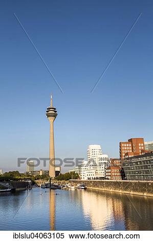 Stock Photography - "Neuer Zollhof and TV tower, Media Harbour, Dusseldorf, North Rhine-Westphalia, Germany, Europe". Fotosearch