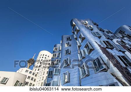 Picture - "Neuer Zollhof or Gehry Bauten buildings, Media Harbour, Dusseldorf, North Rhine-Westphalia, Germany, Europe". Fotosearch