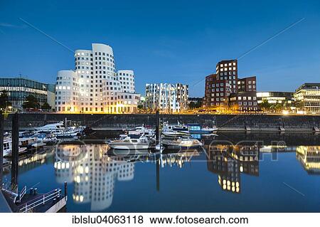 Stock Photo - "Neuer Zollhof or Gehry Bauten buildings, Media Harbour, Dusseldorf, North Rhine-Westphalia, Germany, Europe". Fotosearch