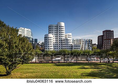 Stock Photograph - "Neuer Zollhof or Gehry Bauten buildings, Media Harbour, Dusseldorf, North Rhine-Westphalia, Germany, Europe". Fotosearch