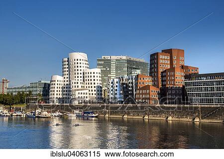 Stock Photography - "Neuer Zollhof or Gehry Bauten buildings, Media Harbour, Dusseldorf, North Rhine-Westphalia, Germany, Europe". Fotosearch