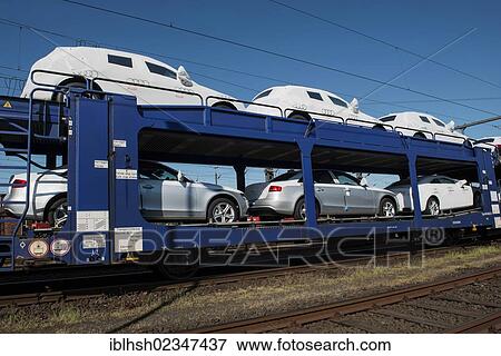 Stock Photo - "New cars produced at the VW plant in Emden loaded onto freight cars, East Frisia, Lower Saxony, Germany, Europe, PublicGround, Europe". Fotosearch