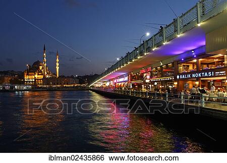 Stock Photograph - "New Mosque, Yeni Cami in the Eminoenue district, Galata bridge, Golden Horn, Istanbul, european side, Turkey, Europe, PublicGround, Asia". Fotosearch
