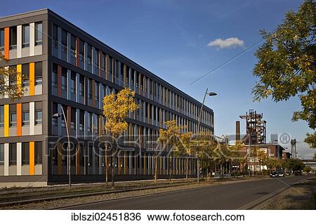 "New office building in front of the heritage-protected blast furnace Hochofen 5 from Phoenix West, Dortmund, North Rhine-Westphalia, Germany, Europe, PublicGround, Europe" View Large Photo Image Stock Photograph - "New office building in front of the heritage-protected blast furnace Hochofen 5 from Phoenix West, Dortmund, North Rhine-Westphalia, Germany, Europe, PublicGround, Europe". Fotosearch