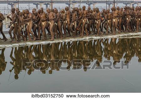 "New sadhus during their initiation, at the Sangam, the confluence of the rivers Ganges, Yamuna and Saraswati, during Kumbha Mela festival, Allahabad, Uttar Pradesh, India, Asia" View Large Photo Image Stock Image - "New sadhus during their initiation, at the Sangam, the confluence of the rivers Ganges, Yamuna and Saraswati, during Kumbha Mela festival, Allahabad, Uttar Pradesh, India, Asia". Fotosearch