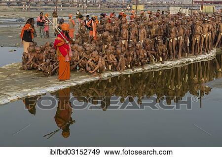 "New sadhus getting orders from gurus as part of their initiation, at the Sangam, the confluence of the rivers Ganges, Yamuna and Saraswati, during Kumbha Mela festival, Allahabad, Uttar Pradesh, India, Asia" View Large Photo Image Stock Photo - "New sadhus getting orders from gurus as part of their initiation, at the Sangam, the confluence of the rivers Ganges, Yamuna and Saraswati, during Kumbha Mela festival, Allahabad, Uttar Pradesh, India, Asia". Fotosearch